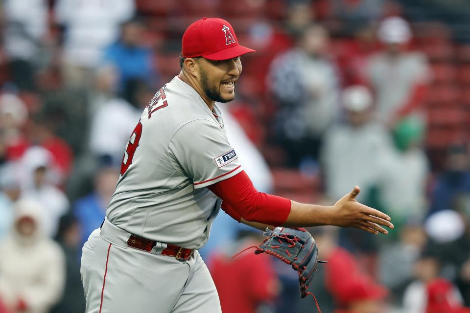 Los Angeles Angels' Carlos Estevez reacts after getting the final out to defeat the Boston Red Sox in the ninth inning of a baseball game, Monday, April 17, 2023, in Boston. (AP Photo/Michael Dwyer)