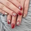 <p>Accent nails can sometimes feel a little abrupt with the rest of your mani, so meld the color scheme together by taking cues from this snowflake mani: Brush a bit of <a href="https://www.amazon.com/China-Glaze-Hopping-Collection-Counting/dp/B00WL8CEM6/ref=sr_1_4?keywords=glitter+nail+polish+gold&qid=1575226411&sr=8-4&tag=syn-yahoo-20&ascsubtag=%5Bartid%7C10049.g.30065321%5Bsrc%7Cyahoo-us" rel="nofollow noopener" target="_blank" data-ylk="slk:gold glitter polish;elm:context_link;itc:0;sec:content-canvas" class="link ">gold glitter polish</a> over a few all-red nails, then paint on some itty-bitty snowflakes.</p><p><a href="https://www.instagram.com/p/B5ht_1hBbKX/" rel="nofollow noopener" target="_blank" data-ylk="slk:See the original post on Instagram;elm:context_link;itc:0;sec:content-canvas" class="link ">See the original post on Instagram</a></p>