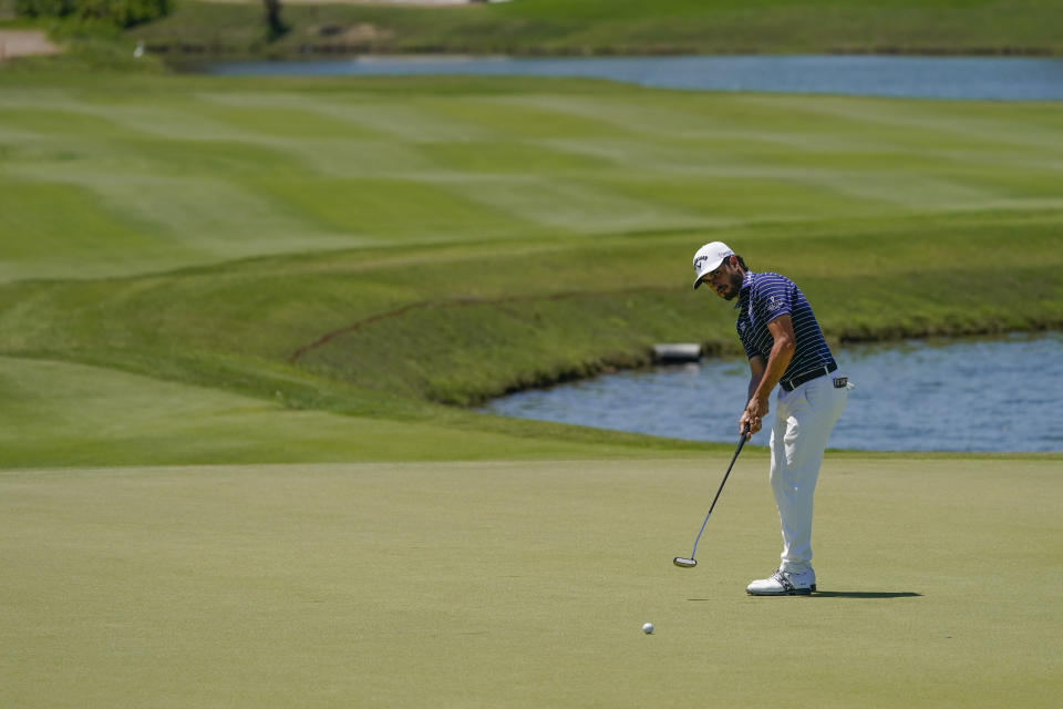 Abraham Ancer, of Mexico, putts on the 15th hole during the third round of the Mexico Open at Vidanta in Puerto Vallarta, Mexico, Saturday, April 30, 2022. (AP Photo/Eduardo Verdugo)