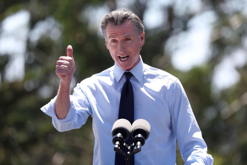 California Gov. Gavin Newsom speaks during a visit to Chabot Space Science Center with U.S. Vice President Kamala Harris on August 12, 2022 in Oakland, California.<span class="copyright">Justin Sullivan—Getty Images</span>