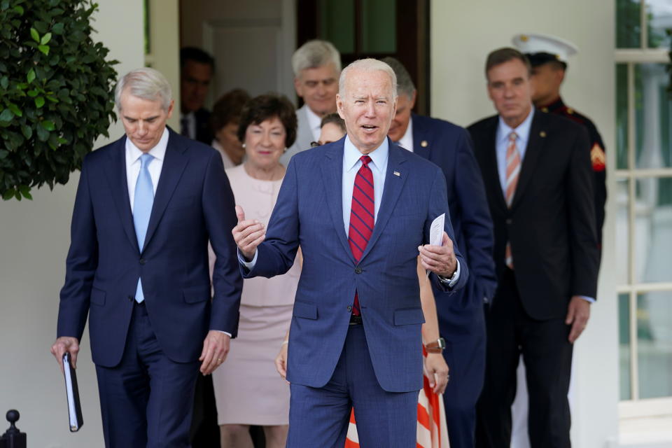 U.S. President Joe Biden exits the West Wing of the White House for talking to the media, following a bipartisan meeting with U.S. senators about the proposed framework for the infrastructure bill, at the White House in Washington, U.S., June 24, 2021. REUTERS/Kevin Lamarque     TPX IMAGES OF THE DAY