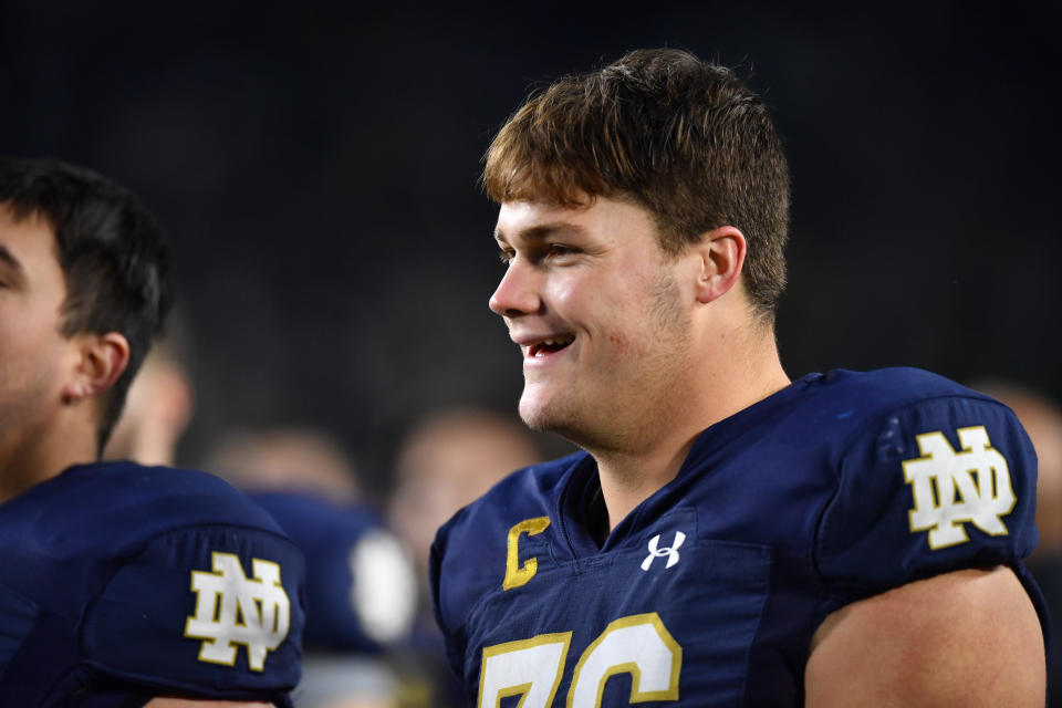 Oct 28, 2023; South Bend, Indiana, USA; Notre Dame Fighting Irish offensive lineman <a class="link " href="https://sports.yahoo.com/ncaaf/players/326144/" data-i13n="sec:content-canvas;subsec:anchor_text;elm:context_link" data-ylk="slk:Joe Alt;sec:content-canvas;subsec:anchor_text;elm:context_link;itc:0">Joe Alt</a> (76) leaves the field following the game against the Pittsburgh Panthers at Notre Dame Stadium. Mandatory Credit: Matt Cashore-USA TODAY Sports