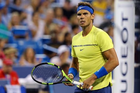 Aug 18, 2017; Mason, OH, USA; Rafael Nadal (ESP) reacts against Nick Kyrgios (AUS) during the Western and Southern Open at the Lindner Family Tennis Center. Mandatory Credit: Aaron Doster-USA TODAY Sports