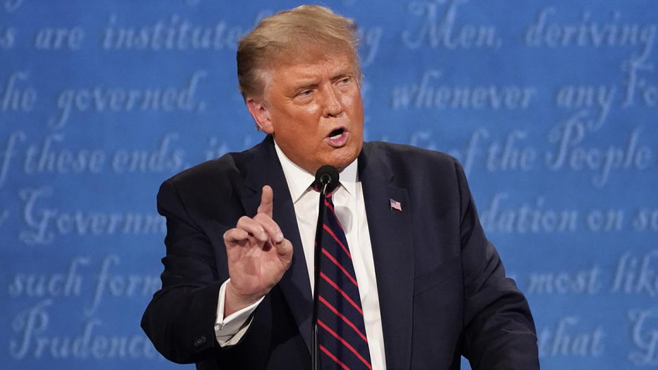 President Donald Trump gestures while speaking during the first presidential debate on Sept. 29, 2020, at Case Western University and Cleveland Clinic, in Cleveland, Ohio. (Julio Cortez/AP)