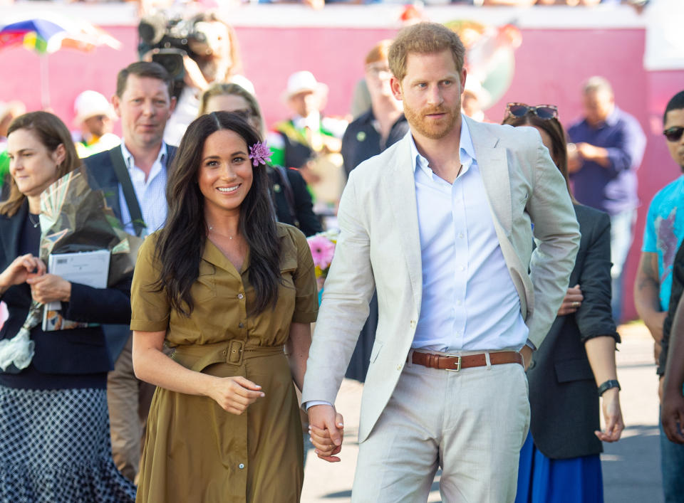 CAPE TOWN, SOUTH AFRICA - SEPTEMBER 24: (UK OUT FOR 28 DAYS) Prince Harry, Duke of Sussex and Meghan, Duchess of Sussex attend Heritage Day public holiday celebrations in the Bo Kaap district of Cape Town, during the royal tour of South Africa on September 24, 2019 in Cape Town, South Africa.  (Photo by Pool/Samir Hussein/WireImage)