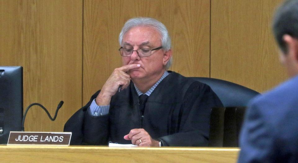 District Court Judge Michael Lands listens in court during a September 2021 hearing in this Gazette file photograph.