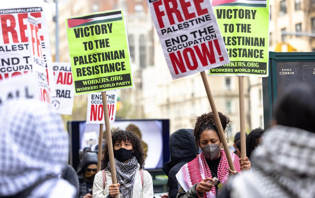 Pro-Palestinian protesters hold a small rally outside of Columbia University