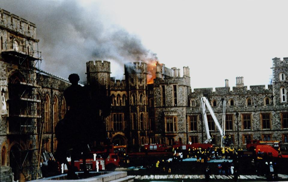 FIRE AT WINDSOR CASTLE - Firemen fighting against fire.