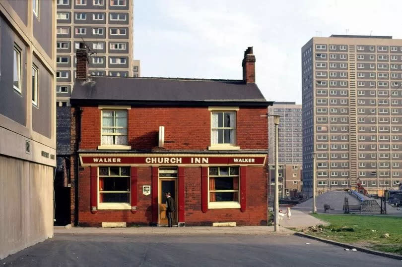 The Church Inn in Ellor Street Salford in 1976 dwarfed by new tower blocks.