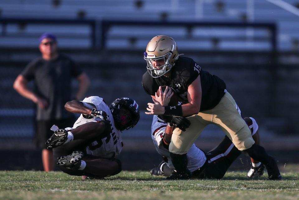 Male senior quarterback Kolter Smith has passed for more than 850 yards this season.