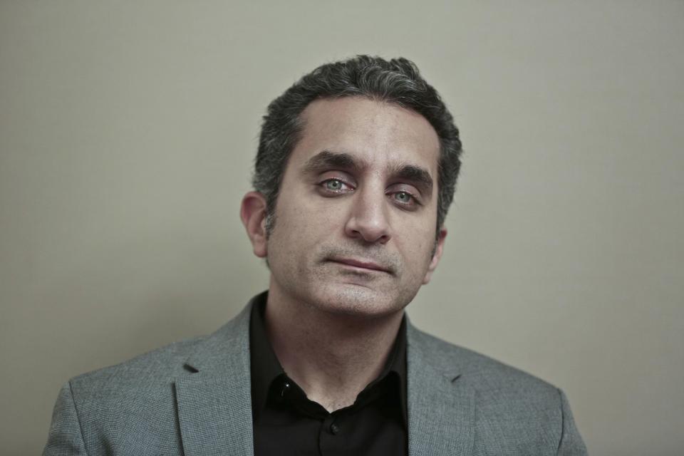 Egyptian satirist Bassem Youssef poses for a photograph at his studio in downtown Cairo, Egypt, Wednesday, Jan. 8, 2014. Youssef, often compared to U.S. comedian Jon Stewart, says his team will bring back its popular television show poking fun at politics in a country still beset by turmoil following a July military coup. However, he acknowledged the challenges facing him and others in Egypt now in an interview with The Associated Press. (AP Photo/Nariman El-Mofty)