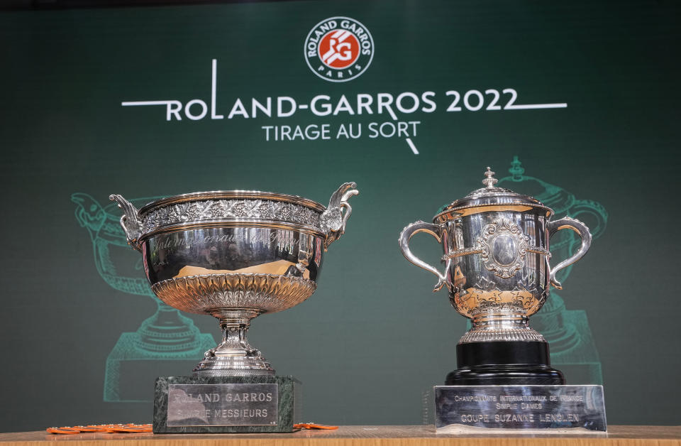 Men's single, left, and women's single cups are displayed during the draw of the French Open tennis tournament at the Roland Garros stadium in Paris, Thursday, May 19, 2022. The French Open tennis tournament starts Sunday May 22. (AP Photo/Michel Euler)