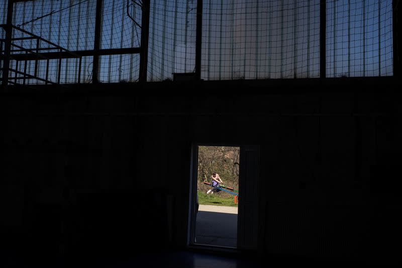 The Wider Image: In Serbian village, women fight to escape encroaching mine