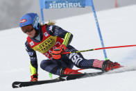 FILE - United States' Mikaela Shiffrin speeds down the course on her way to win an alpine ski, women's World Cup giant slalom, her 84th World Cup race, in Kronplatz, Italy, Wednesday, Jan. 25, 2023. Shiffrin isn't putting the same pressure on herself for the upcoming world championships, starting on on Feb. 6, 2023 in Courchevel and Meribel, France, that she did for last year's Beijing Olympics. The event is Shiffrin's first major championship since American skier didn't win a medal and didn't finish three of her five races at the Olympics. (AP Photo/Alessandro Trovati, File)