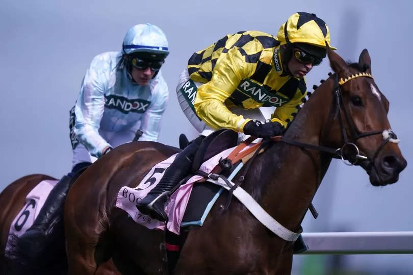 Sir Gino, ridden by Nico De Boinville (right), beats Kargese, ridden by Paul Townend, in the Boodles Anniversary 4-Y-O Juvenile Hurdle on day one of the 2024 Randox Grand National Festival at Aintree Racecourse on Thursday, April 11 2024