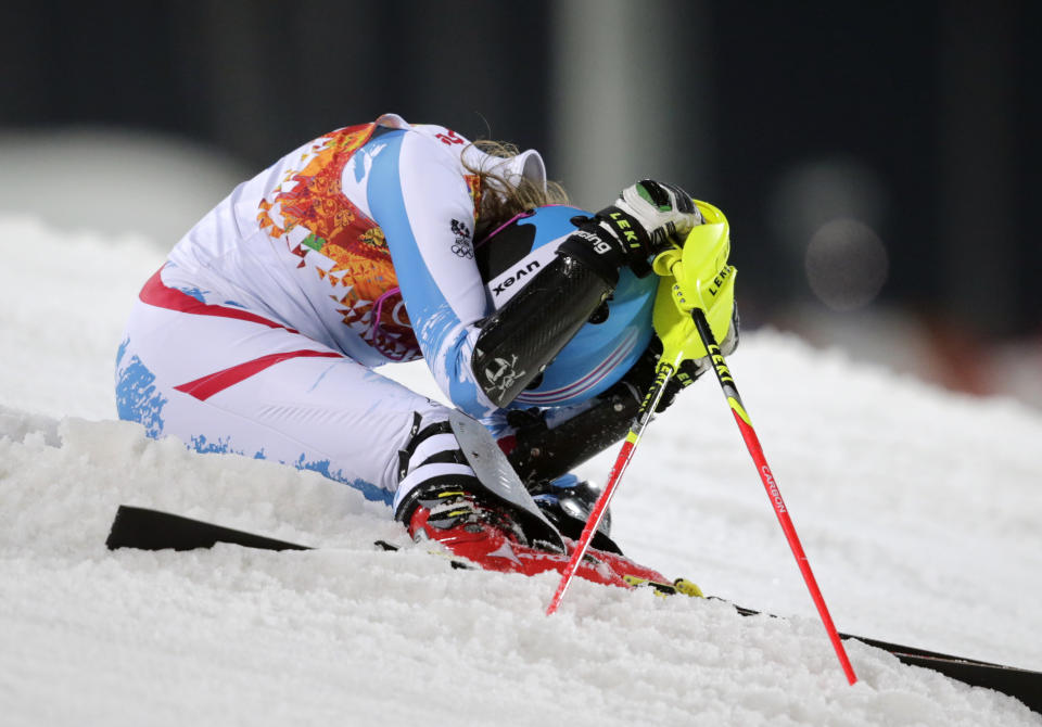 Austria's Bernadette Schild reacts after skiing out of the second run in the women's slalom at the Sochi 2014 Winter Olympics, Friday, Feb. 21, 2014, in Krasnaya Polyana, Russia. (AP Photo/Charles Krupa)