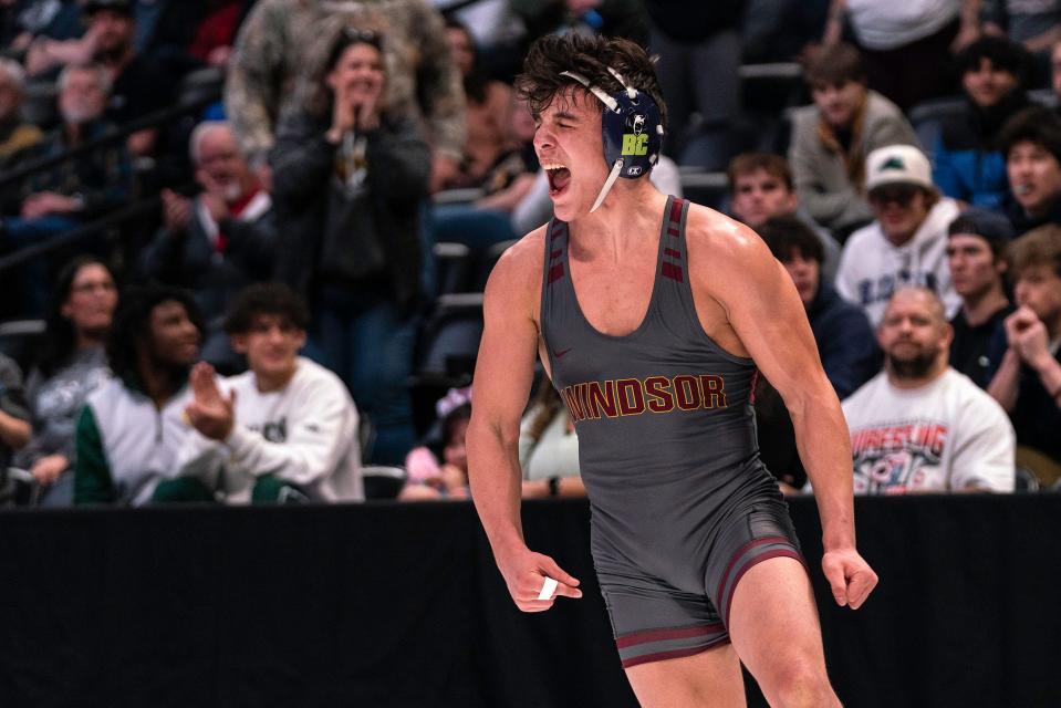 Windsor freshman wrestler Evan Perez yells in celebration after winning the Class 4A 165-pound state championship during the Colorado state wrestling tournament on Saturday at Ball Arena in Denver.