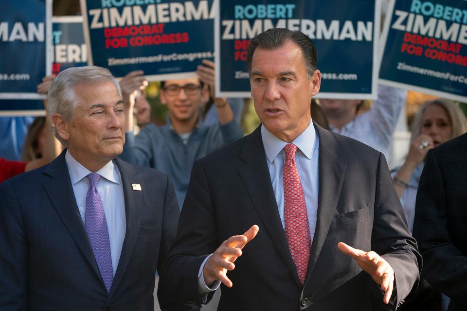 Rep. Tom Suozzi, D-N.Y., right, speaks alongside Robert Zimmerman, Democratic candidate for New York's 3rd Congressional District, during a news conference, Monday, Nov. 7, 2022, in Great Neck, N.Y. The Tuesday contest for New York's District 3 House seat held by George Santos until his recent expulsion is shaping up to be a bellwether in the fight for control of Congress, with Suozzi pitted against GOP candidate Mazi Pilip.