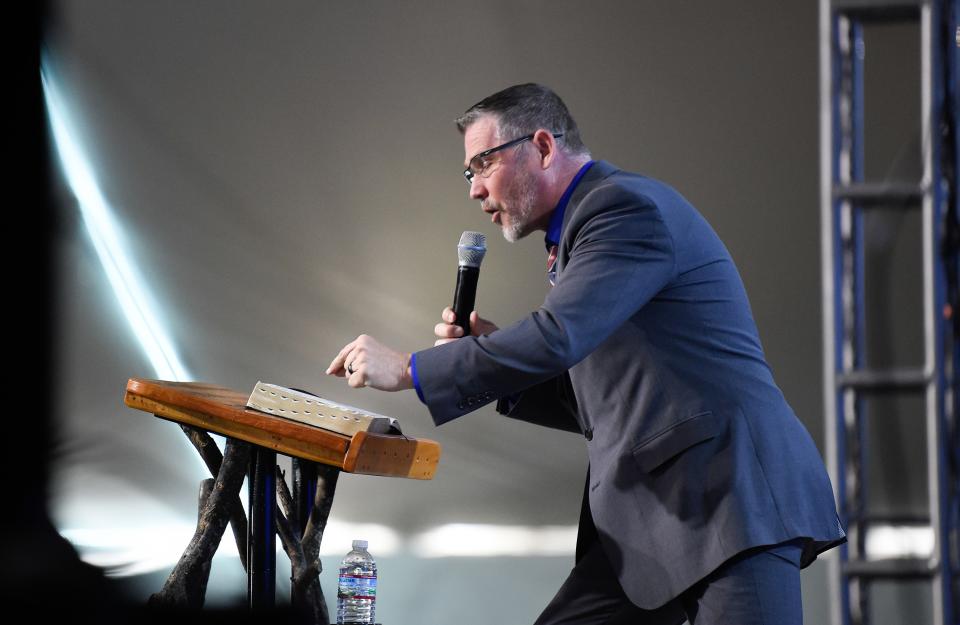 Pastor Greg Locke does his sermon at the Global Vision Bible Church in Mt. Juliet, Tenn., Sunday, April 3, 2022.