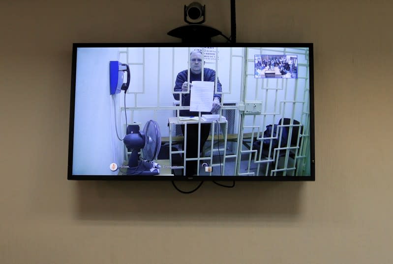 FILE PHOTO: Former U.S. marine Whelan is seen on a screen via a video link during a court hearing in Moscow