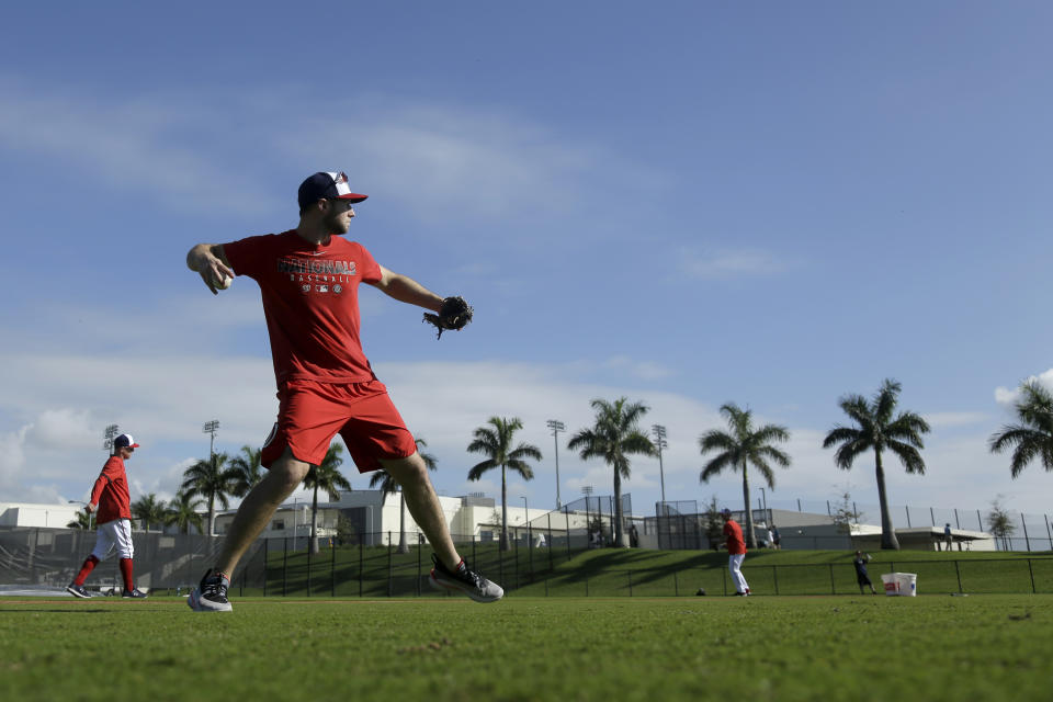 Washington Nationals infielder Carter Kieboom throws during spring training baseball practice Monday, Feb. 17, 2020, in West Palm Beach, Fla. (AP Photo/Jeff Roberson)
