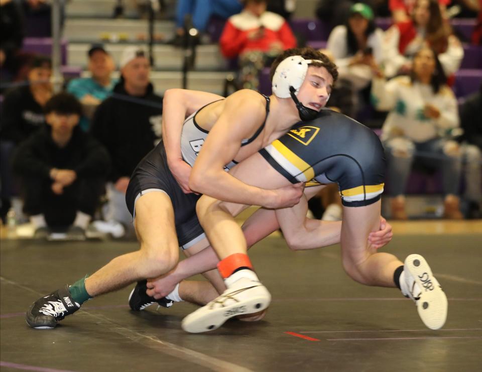 Nick Fortugno from BBHVW on his way to defeating Vinny Augello from Commack in the 108 pound weight class, during the 2024 Murphy-Guccione Shoreline Wrestling Classic at New Rochelle High School, Jan. 6, 2024.