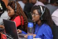 Customer service agents are seen at the Jumia customer service office in Lagos