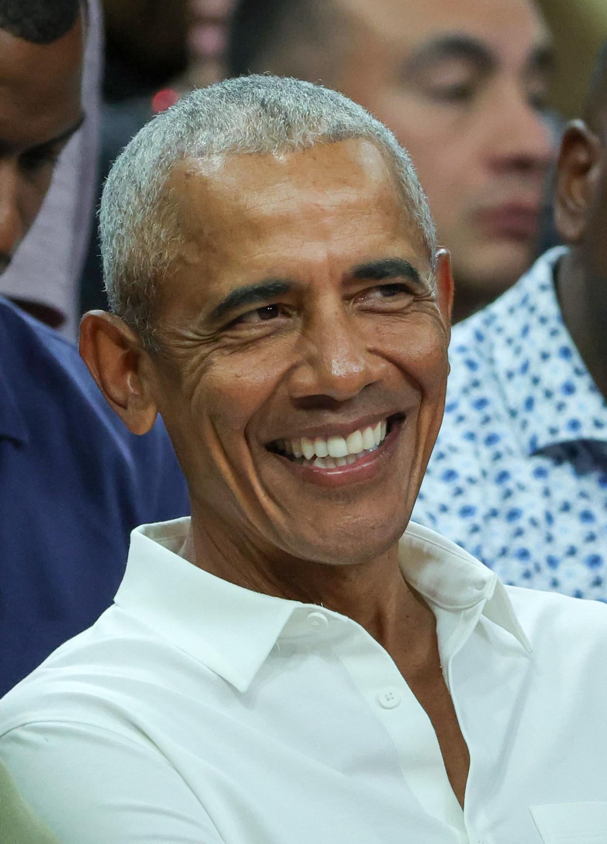 Barack Obama, pictured, is sharing the music he's been rocking out to and the books he's been reading this summer, including songs by Charli XCX and Shaboozey.