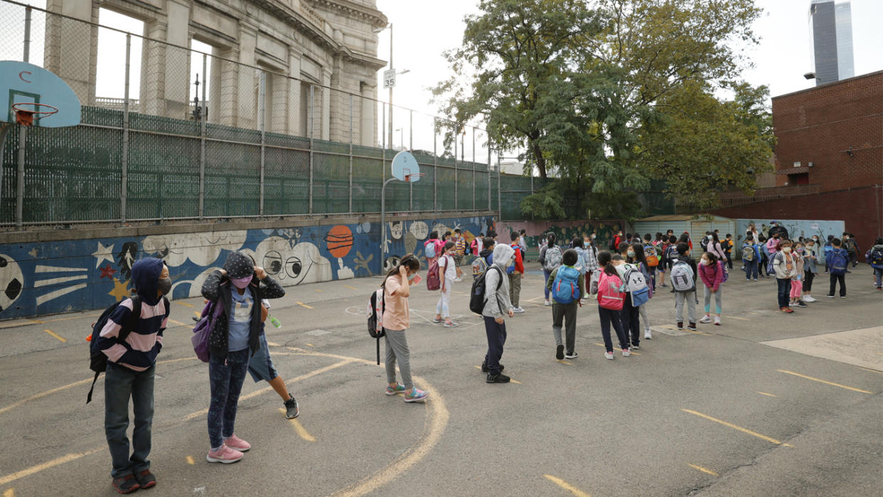 Students line up in the morning at Yung Wing School P.S. 124 