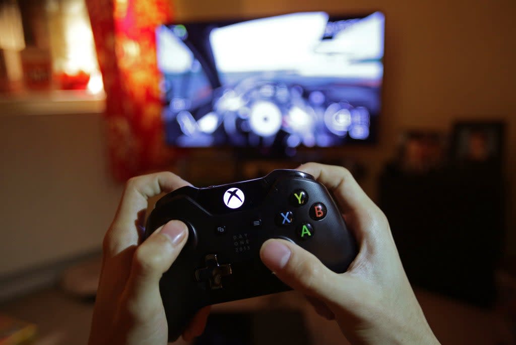 Microsoft is to change how it handles the automatic renewal of subscriptions for its online Xbox gaming services in response to an investigation by the UK’s competition watchdog (PA) (PA Archive)