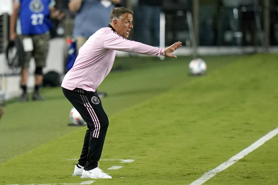 Inter Miami coach Phil Neville watches during the first half of the team's MLS soccer match against Montreal, Wednesday, May 12, 2021, in Fort Lauderdale, Fla. (AP Photo/Lynne Sladky)