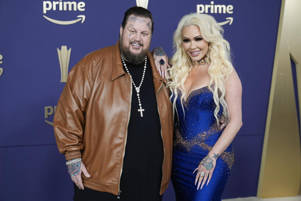 Jelly Roll, left, and Bunnie XO arrive at the 59th annual Academy of Country Music Awards on Thursday, May 16, 2024, at the Ford Center in Frisco, Texas. (AP Photo/LM Otero)