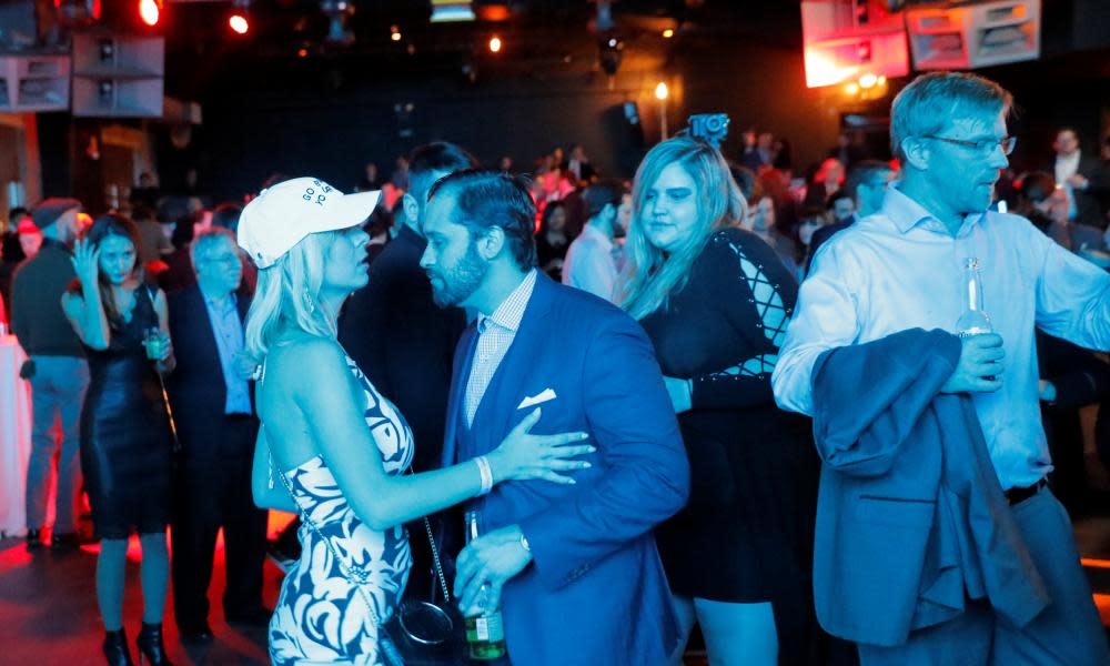 People dance at the “A Night for Freedom” event organized by Mike Cernovich, in Manhattan, New York.