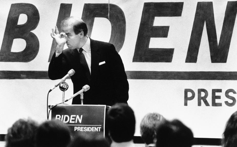 Presidential hopeful Sen. Joseph Biden, D-Del., gestures during a speech to students on the University of Iowa campus, April 13, 1987, Iowa City, Iowa. (AP Photo/Rodney White)