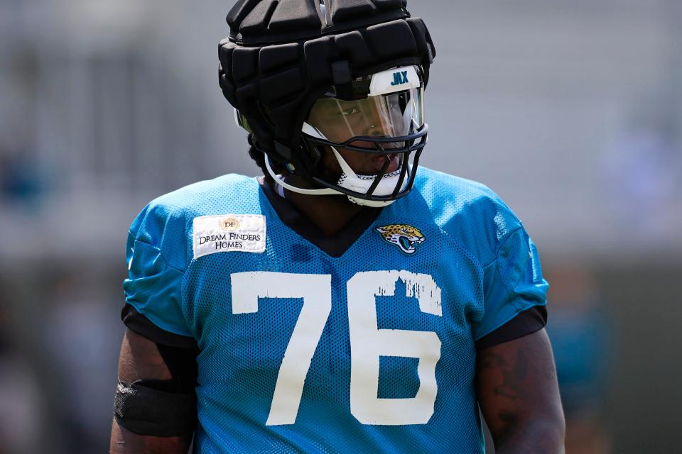 Jacksonville Jaguars offensive tackle Anton Harrison (76) warms up Monday, Aug. 14, 2023 at Miller Electric Center at EverBank Stadium in Jacksonville, Fla. Today was the 14th training camp session. 