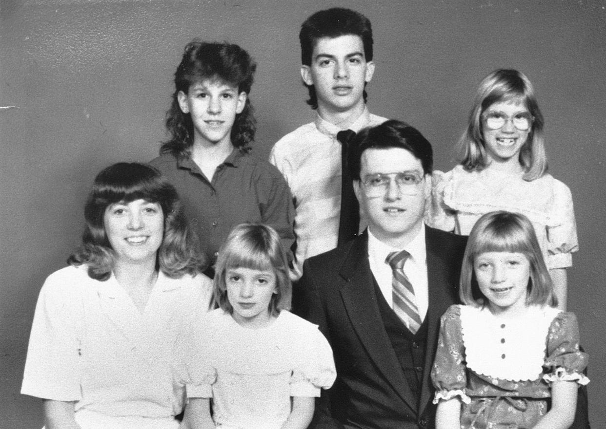 A family portrait from the late 1980's shows the Robert Pelley family of Lakeville, Ind. In April 1989, Pelley and his wife, Dawn, were shot and killed in their home along with two daughters seated in the photo, from left, Jolene, 6, and Janel, 8. Standing in the back row, from left, are Jackqueline, then 14; Jeff Pelley, then 17; and Jessica, then 10.