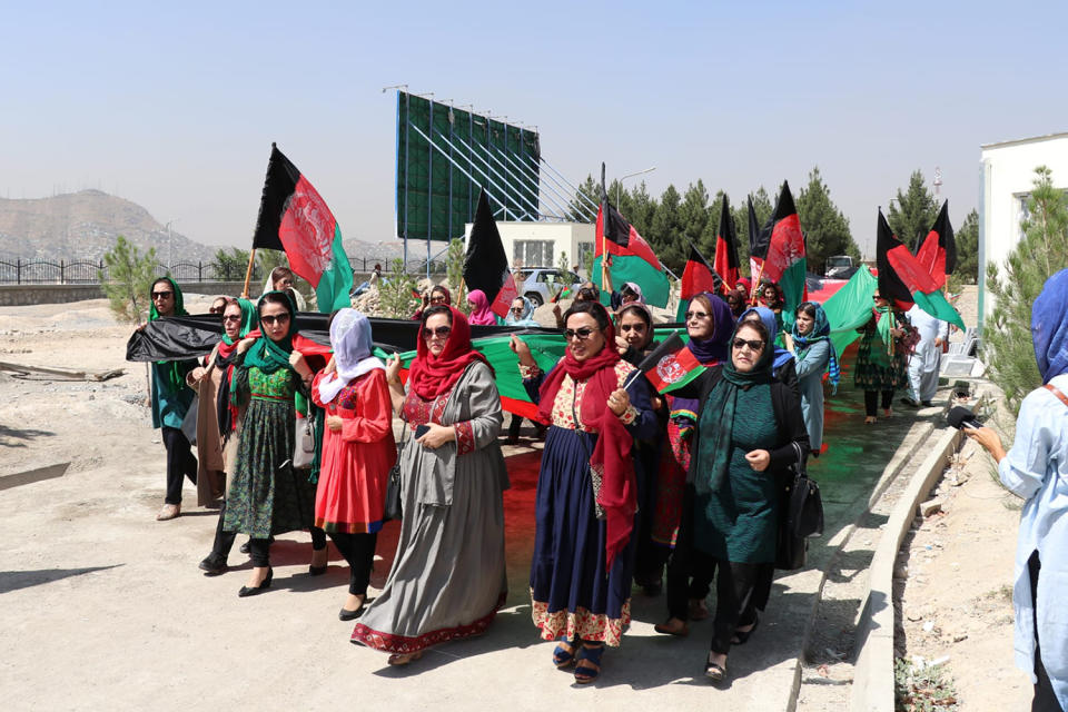 Roshan Mashal, center, leading a march for women’s rights in Afghanistan before the U.S. withdrawal from the country. (Courtesy Roshan Mashal)
