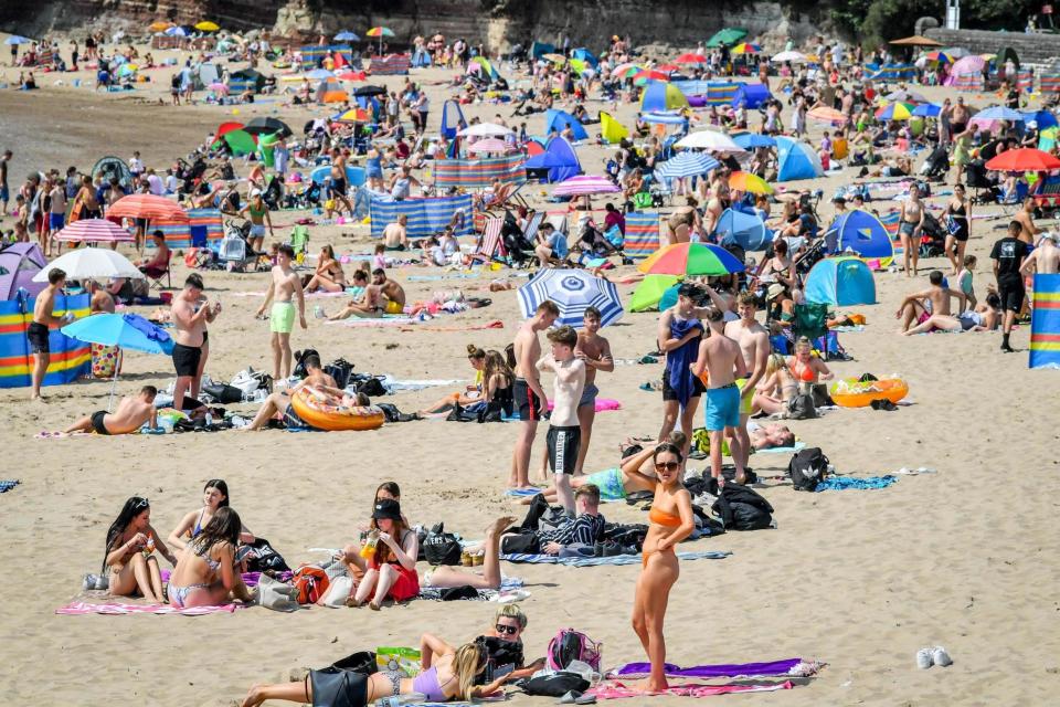 Sunseekers flocked to Barry Island on Friday: PA