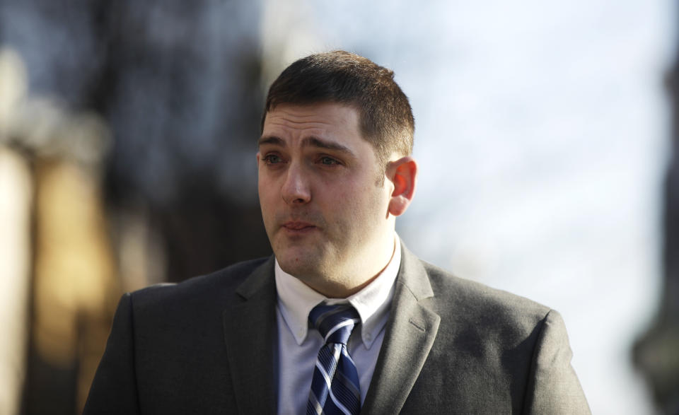 Former East Pittsburgh police officer Michael Rosfeld, charged with homicide in the shooting death of Antwon Rose II, arrives at the Dauphin County Courthouse in Harrisburg, Pa., Tuesday, March 12, 2019. (AP Photo/Matt Rourke)