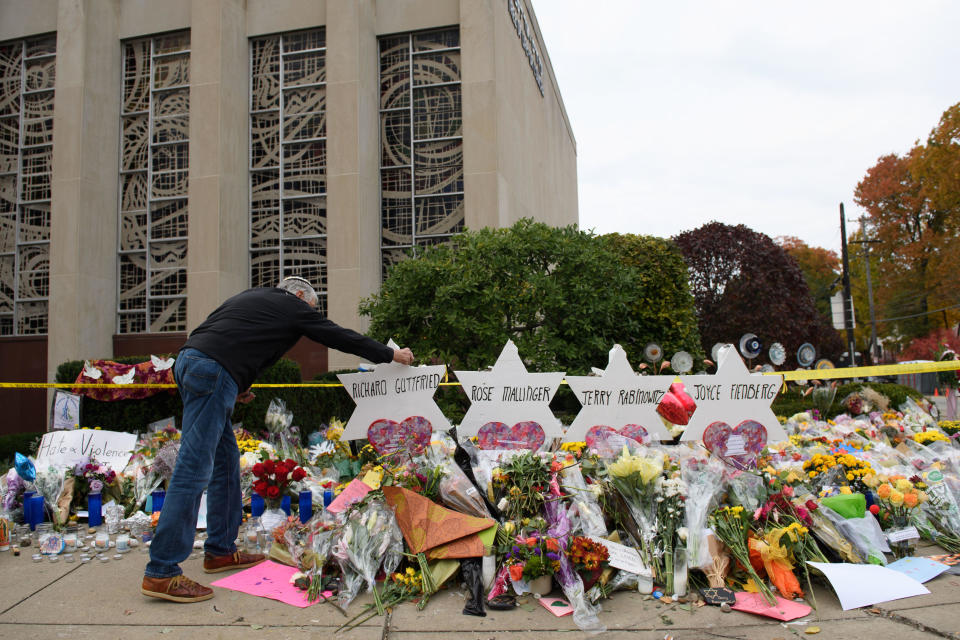 Mourners visit the memorial outside the Tree of Life synagogue on Oct. 31, 2018, in Pittsburgh, Pennsylvania, after 11 people were killed in a mass shooting on Oct. 27. / Credit: Jeff Swensen / Getty Images