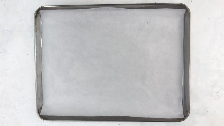 rimmed sheet lined with parchment paper