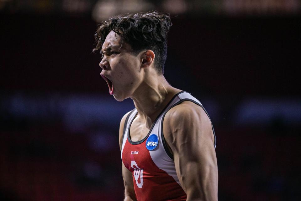 OU's Zach Nunez screams to the crowd after scoring a team-best 13.833 on the pommel horse.