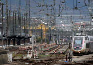 Trains park at the Hendaye train station, southwestern France, Sunday Dec.8, 2019 on the fourth day of nationwide strikes that disrupted weekend travel around France. (AP Photo/Bob Edme)