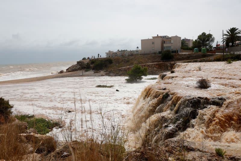Water fills the ravines in torrents on the way to the sea on the Mediterranean coast in Alcanar