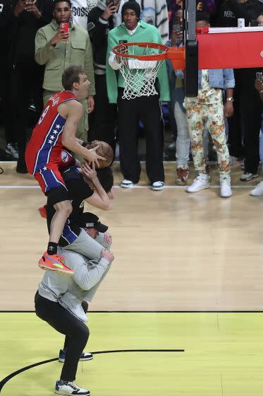 Mac McClung of the Philadelphia 76ers shoots during the slam dunk competition of the NBA basketball All-Star weekend.