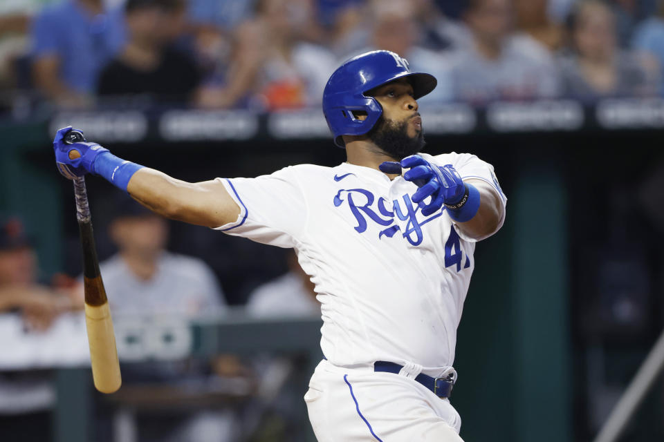 Kansas City Royals' Carlos Santana watches his three-run home run hit to take the lead against the Detroit Tigers in the seventh inning of a baseball game at Kauffman Stadium in Kansas City, Mo., Saturday, July 24, 2021. (AP Photo/Colin E. Braley)