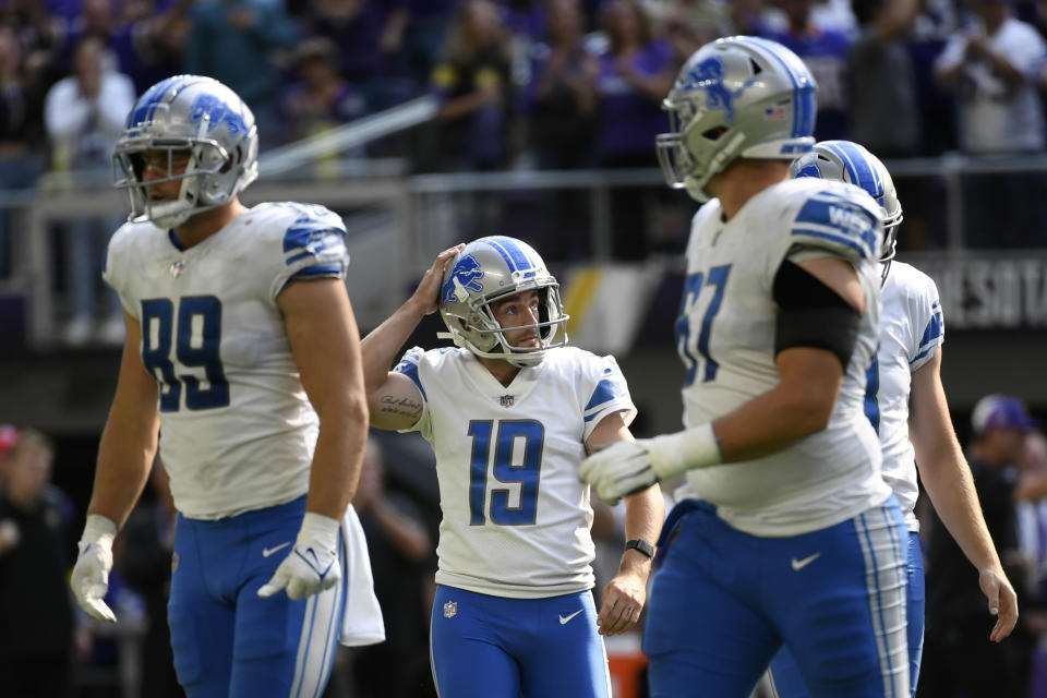 Detroit Lions place kicker Austin Seibert (19) reacts after missing a field goal during the second half of an NFL football game against the Minnesota Vikings, Sunday, Sept. 25, 2022, in Minneapolis. The Vikings won 28-24. (AP Photo/Craig Lassig)