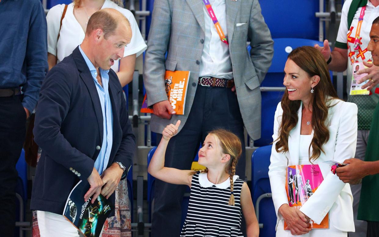 Duke and Duchess of Cambridge and Princess Charlotte at Commonwealth Game - Elsa/Getty Images