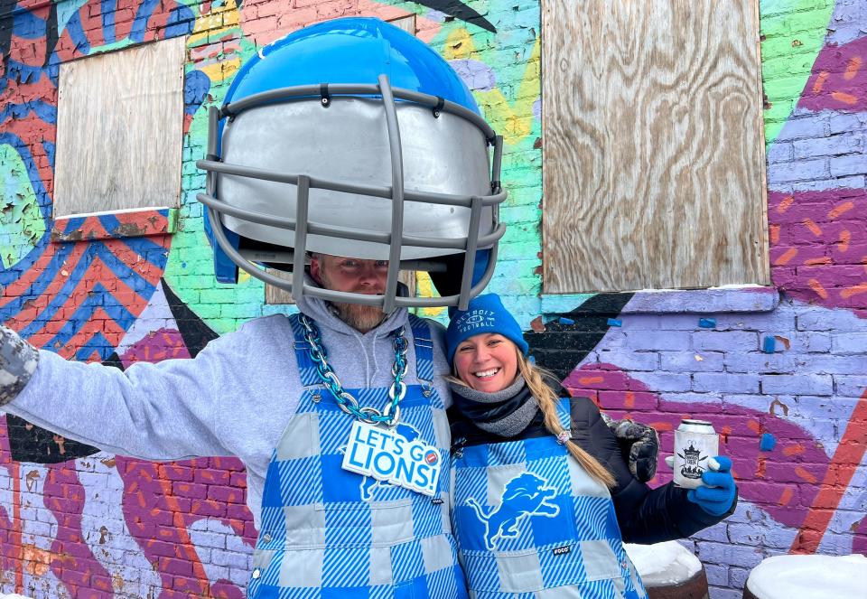 Scott Shephard and his wife,Brittany, were a hit at the Eastern Market tailgate scene, as fans stopped them for photos. Scott said he and a friend made the helmet and he wore it for the first time ahead of the Lions game against the Los Angeles Rams. "That's why they won," he said.