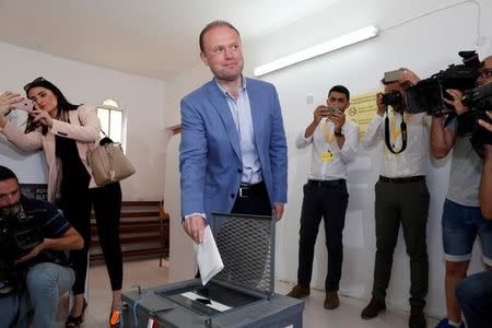 Prime Minister and Labour Party leader Joseph Muscat casts his vote during Malta's snap general elections in his home town of Burmarrad, Malta, June 3, 2017. REUTERS/Darrin Zammit Lupi